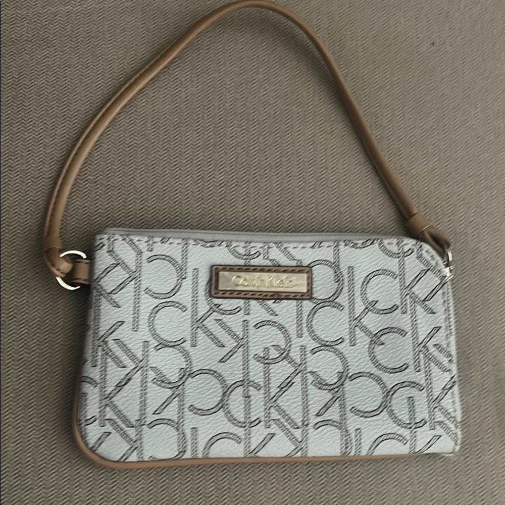 Calvin Klein White and Tan Wristlet with Logo Pattern